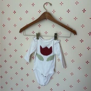 White Long-Sleeve Baby One-Piece with Red Tulip Applique